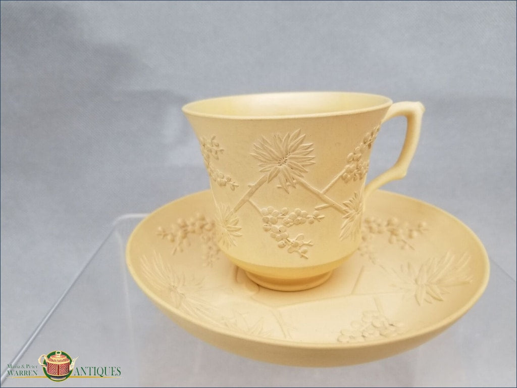 http://warrenantiques.com/cdn/shop/products/an-english-caneware-tea-cup-and-saucer-c1810-15-impressed-wedgwood-mark-19th-century-pottery-warrenantiques-com_1_917_1200x1200.jpg?v=1538170624