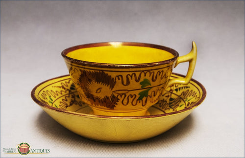 https://warrenantiques.com/products/yelloware-teacup-and-saucer-swansea-c1820