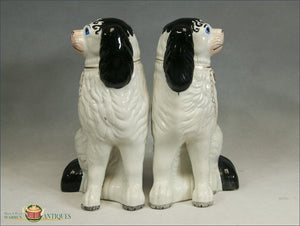 https://warrenantiques.com/products/a-pr-of-english-black-and-white-superb-disraeli-spaniels-with-separate-legs-c1860