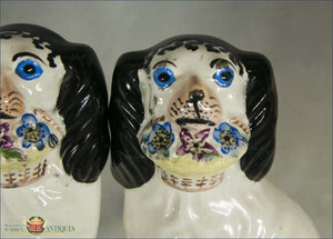 A Wonderful Pair Of English Staffordshire Disraeli Dogs Holding Baskets Pre 1840 Figures