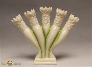 https://warrenantiques.com/products/an-english-creamware-green-enamel-decorated-quintel-1780-90