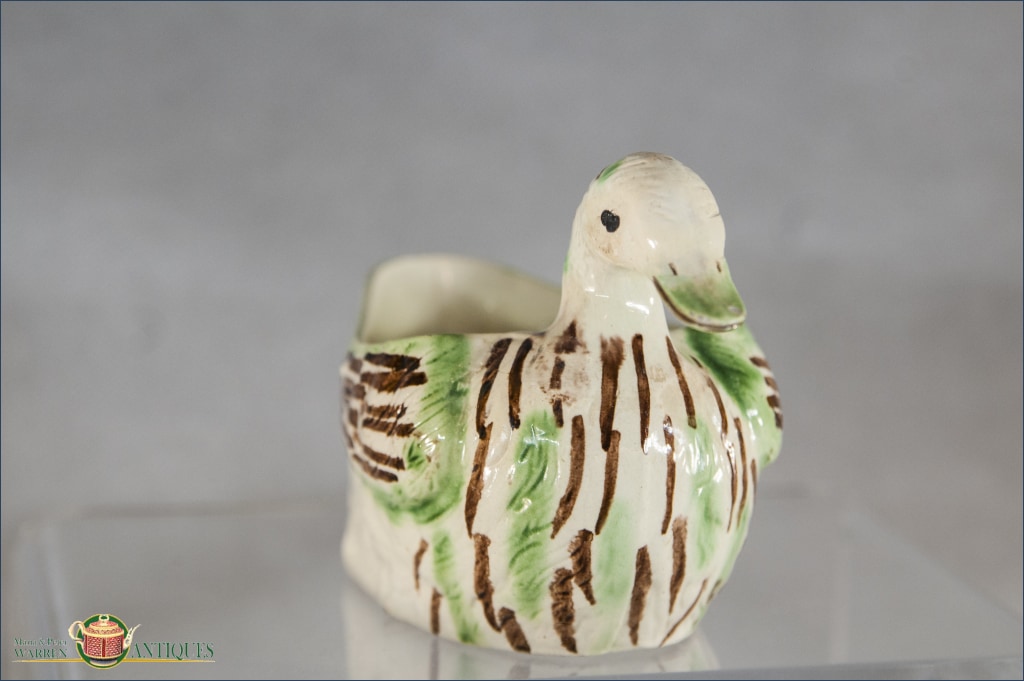 https://warrenantiques.com/products/an-english-creamware-sauceboat-in-the-form-of-a-duck-c1790-1800