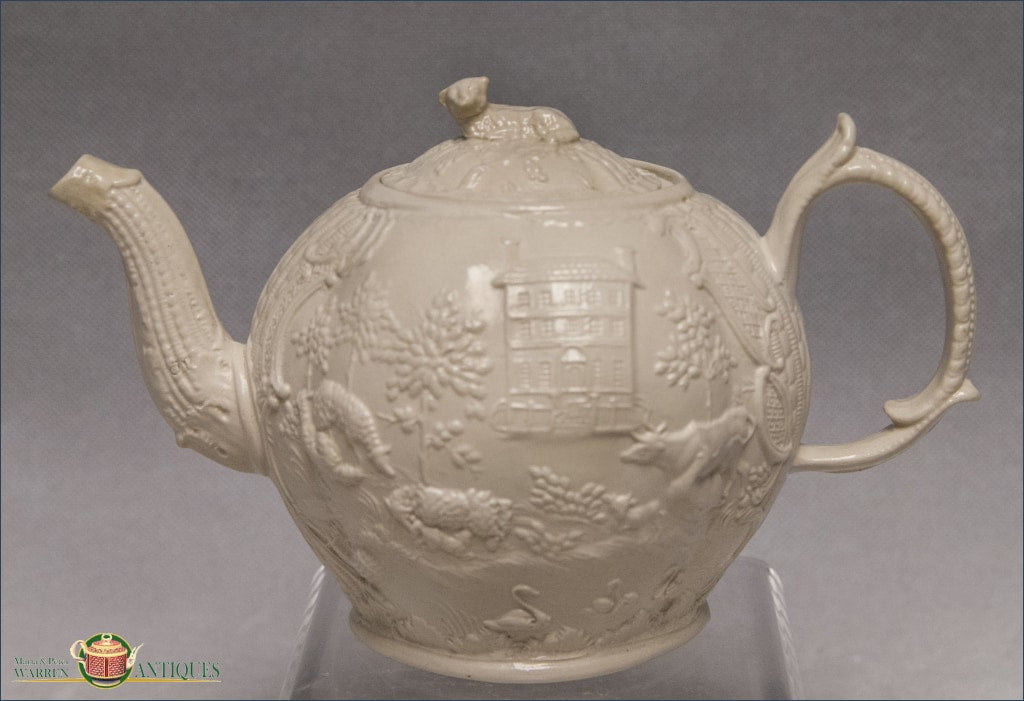 https://warrenantiques.com/products/english-saltglaze-stoneware-landskip-teapot-c1750