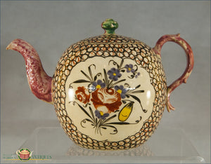 https://warrenantiques.com/products/english-creamware-chintz-decorated-wedgwood-teapot-and-cover-c1768