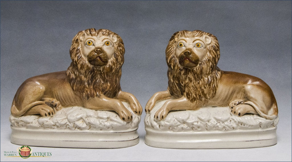 https://warrenantiques.com/products/pair-of-english-staffordshire-recumbent-lions-c1890-1900